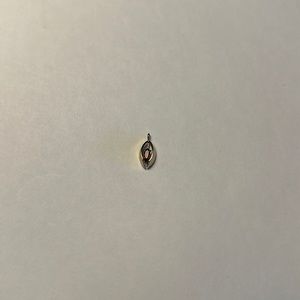 Gold Over Pendant with a genuine Garnet Stone